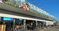 Fahrradgeschäft mit Wandmalerei